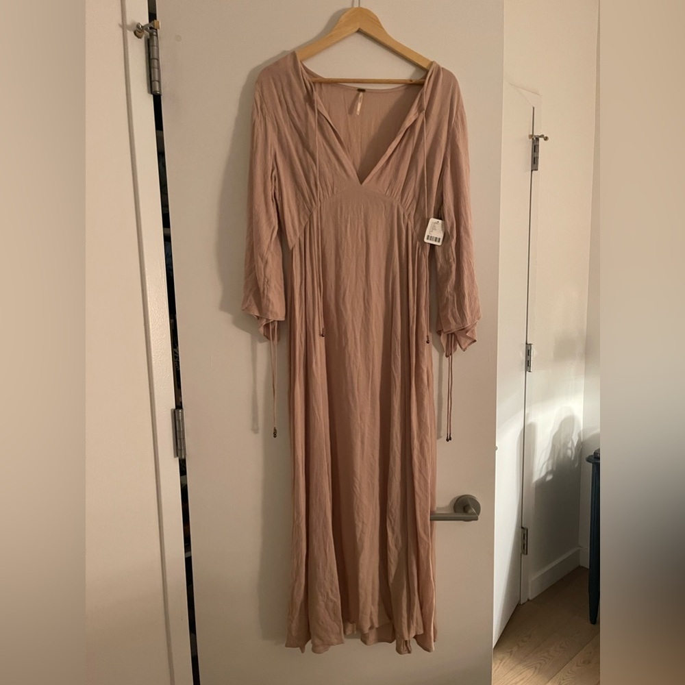 This is a vintage Free People dress, very on trend for 2025 summer